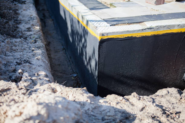 Professional Waterproofing technician working in Markleville, IN